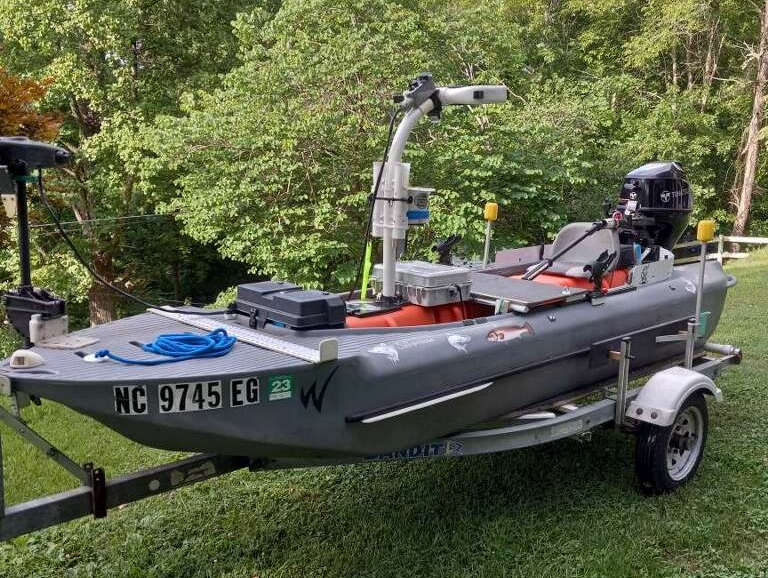 Wavewalk S4 with 9.8 HP outboard motor